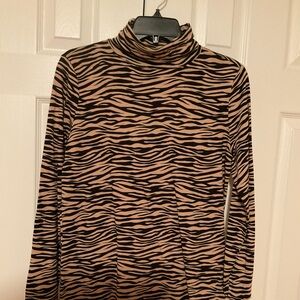 Brand new and super soft turtleneck.  Tiger stripe design.  Loft
